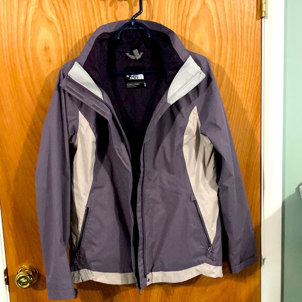 Northface windbreaker rain jacket. Tones of purple. Size M.